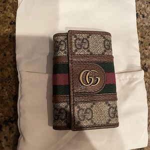 GUCCI key case in GG canvas with green and red stripe.Excellent condition!